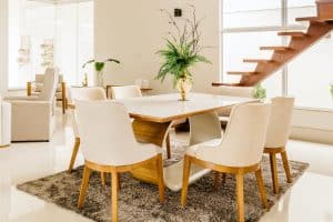 white wooden table with chairs